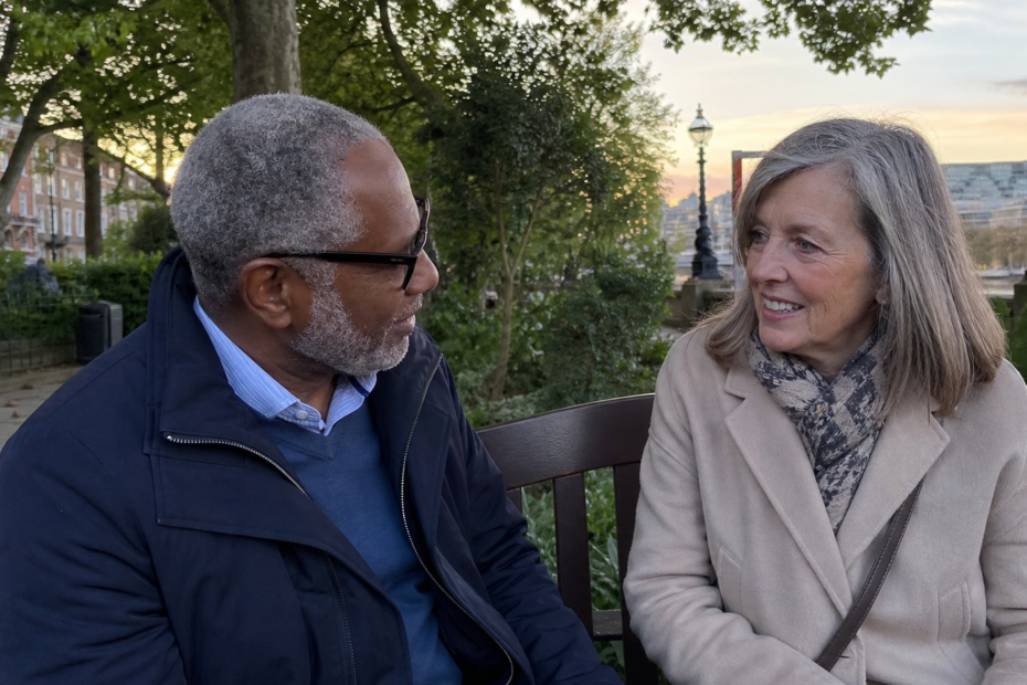 Mature couple over 60 having a relaxed conversation near Chelsea Embankment